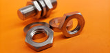 24-09 Cylinder Plug Nuts and 34-17 Cylinder Plug Washers. 2 of Each Harley JD J F